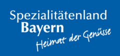 Logo „Spezialitätenland Bayern“ auf blaumen Hintergrund
